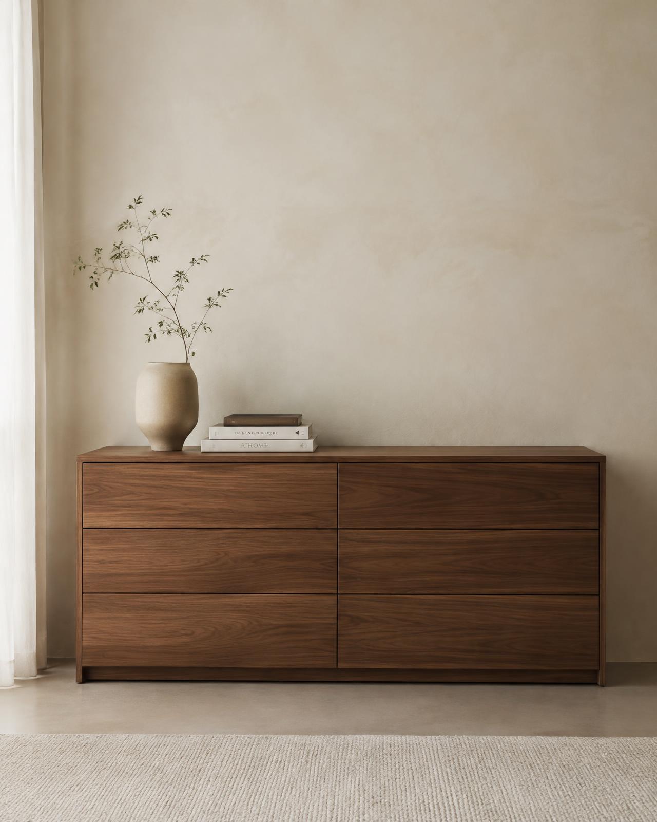 The Linea Chest of Drawers in a serene architectural interior